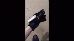 Hand wearing a cardboard box glove