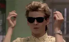 Valley Boy Adjusts Sunglasses