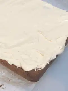 Spreading frosting on a cake