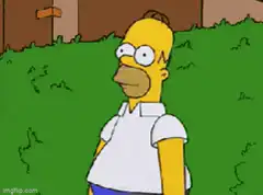 Homer Simpson hiding in the grass