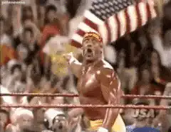Hulk Hogan points and screams in ring