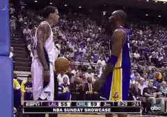 Kobe Bryant and Dwight Howard stare down