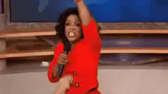 Oprah Winfrey pointing excitedly