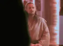 Qui-Gon Jinn sitting calmly