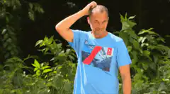 Man scratching head in confusion