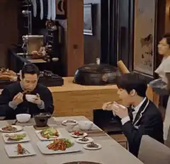 Woman splashes soup on man