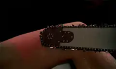 Chainsaw blade on thigh