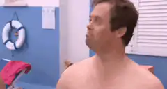 Dude flexing muscles