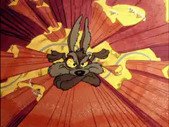 Wile E. Coyote falling down a canyon