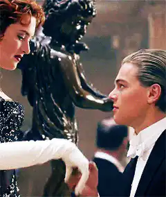 Jack kisses Rose's gloved hand