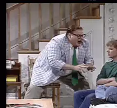 Cliff Clavin yelling at a guy