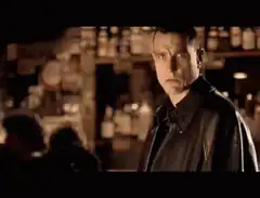 Vincent Vega intense stare then turns away
