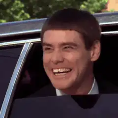 Jim Carrey laughing in a car