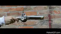 Handgun firing with muzzle flash