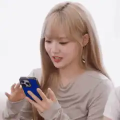 Girl looking at phone and gesturing