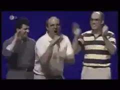 Three men dancing on stage