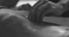 Hand tracing liquid on skin