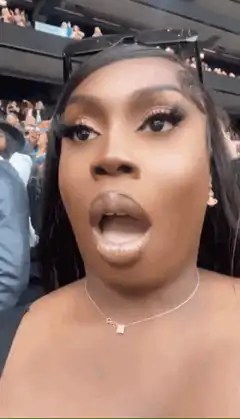 Woman with shocked expression at event