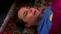 Jim Parsons lying on floor with two kids