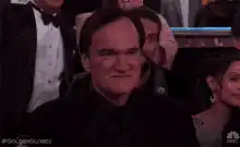 Quentin Tarantino sips champagne