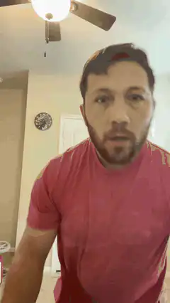 Man in red shirt dancing