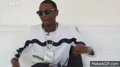 Lil Wayne dancing on a couch