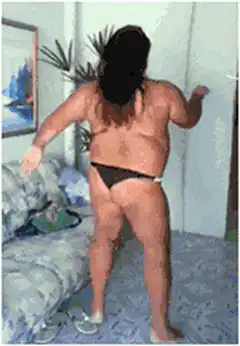 Man in black thong dancing