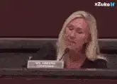 Woman tossing a coin in court