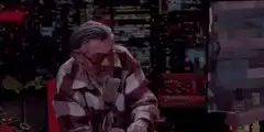 Gary Oldman talking with hand gestures