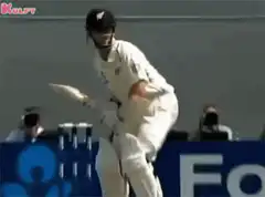 Cricket batsman hits ball into the air