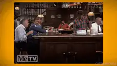Barney Fife pours a drink for Barney