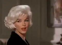 Marilyn Monroe winking and smiling