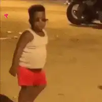 Kid in red shorts dancing