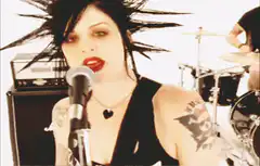 Amy Lee singing with spiky hair