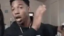 Man smelling a stack of money