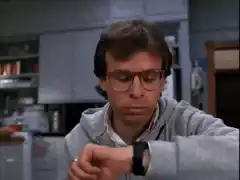Bill Ponderosa checks watch and looks up