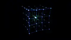 Rotating blue wireframe cube with green center
