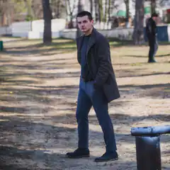 Man in park looking back
