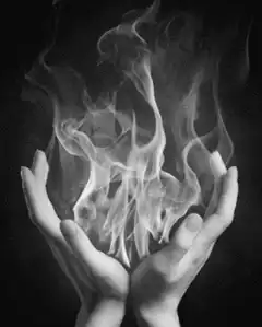 hands holding fire