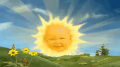 Smiling Baby Sun over Green Hills