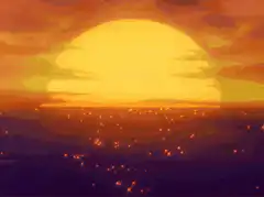 Sunset over ocean with glowing particles
