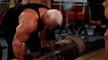 Hulk Hogan lifting a log