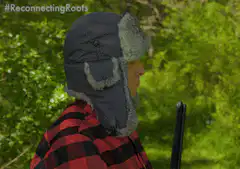 Lumberjack turns around surprised