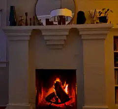 Cozy fireplace with flickering fire