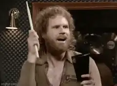 Seth Rogen drumming with a cup