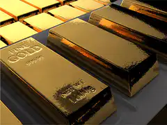 Gold bars being stamped and polished