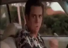 Jim Carrey eating a mint in a car