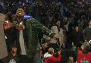 Kobe Bryant holding up a Sprite 10 sign