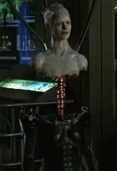 Alien woman head rises from body