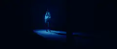 Holographic woman in blue light